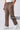 Chocolate cargo jogger with boxy side utility pockets on a white background