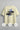 Off white t-shirt with 'Be Kind Always' graphic on a gray background