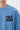 LIght blue t-shirt with '2020 FREEDOM STREET WEAR' text on a plain background