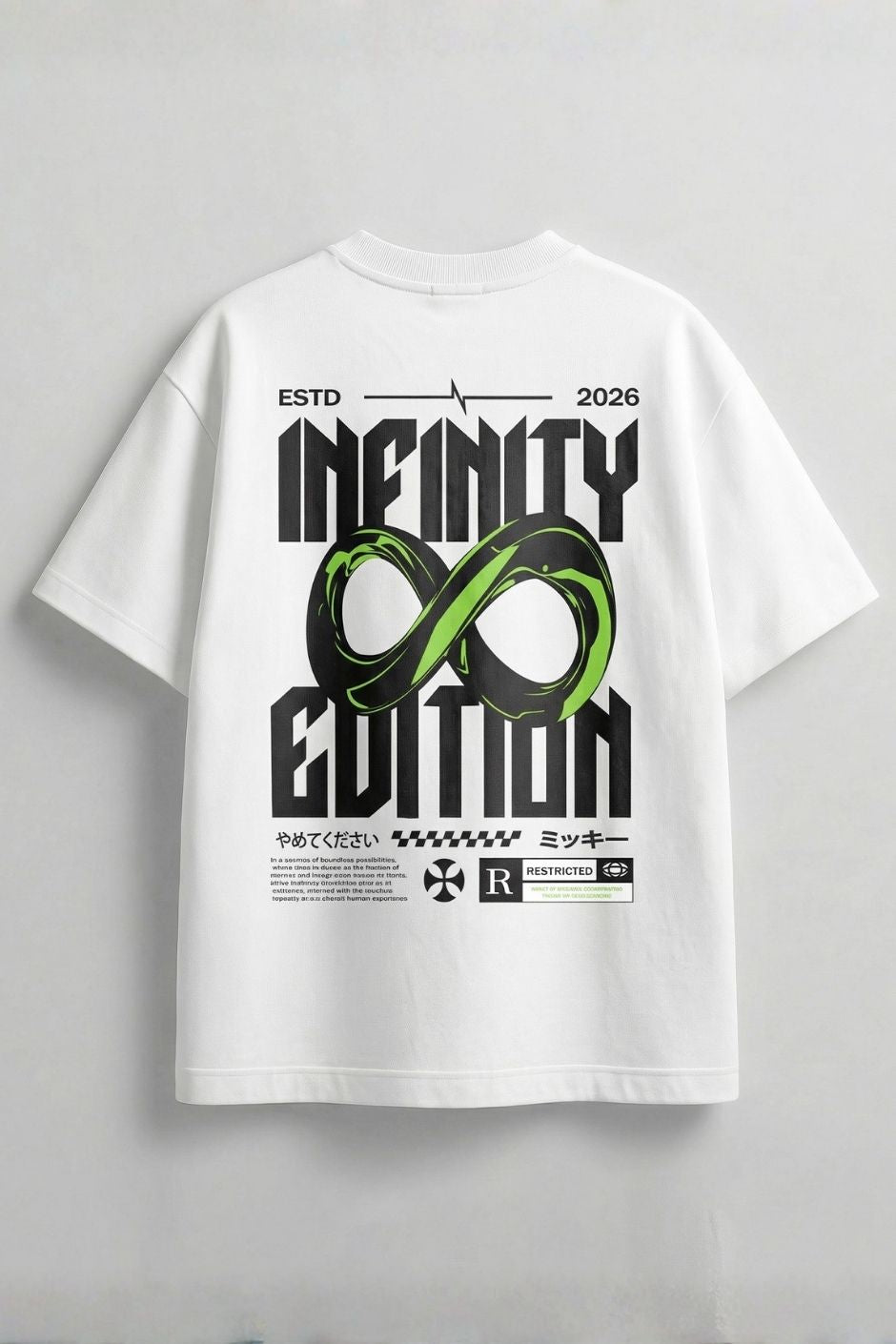 White t-shirt with black and green graphic design on a gray background