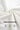 Close-up of white fabric with premium heavy gauge text and icons on a white background