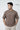 Man wearing a chocolate t-shirt with 'panoramic' logo on a white background