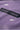 Lilac shirt with 'Straight Forward' text label on a purple background