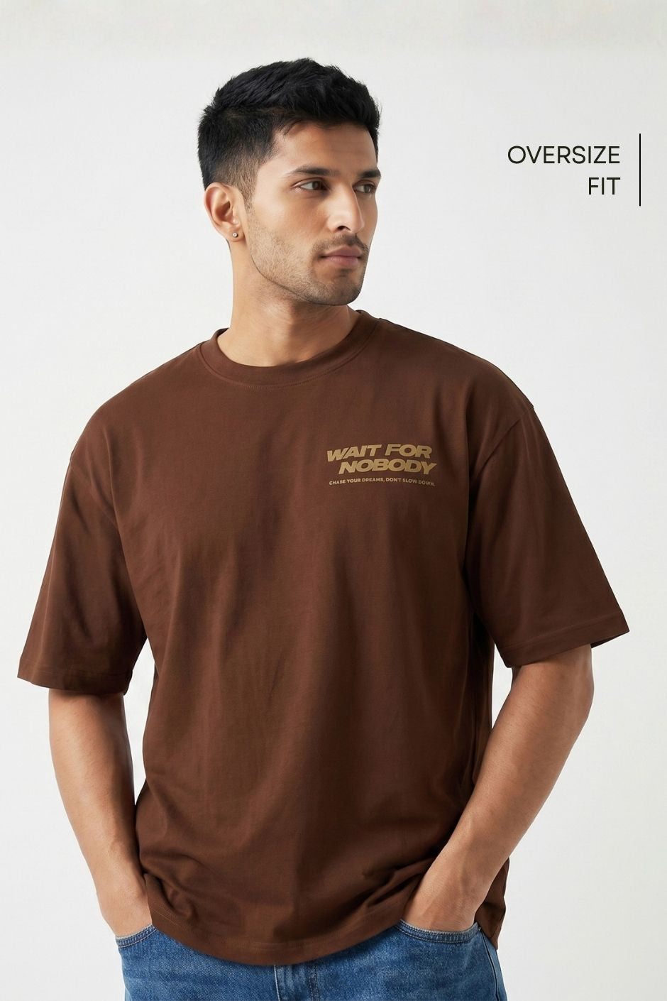 Man wearing a brown t-shirt with text on a white background