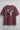 Plum t-shirt with black and white graphic design on a light gray background