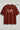 Rust t-shirt with world map design on a light gray background